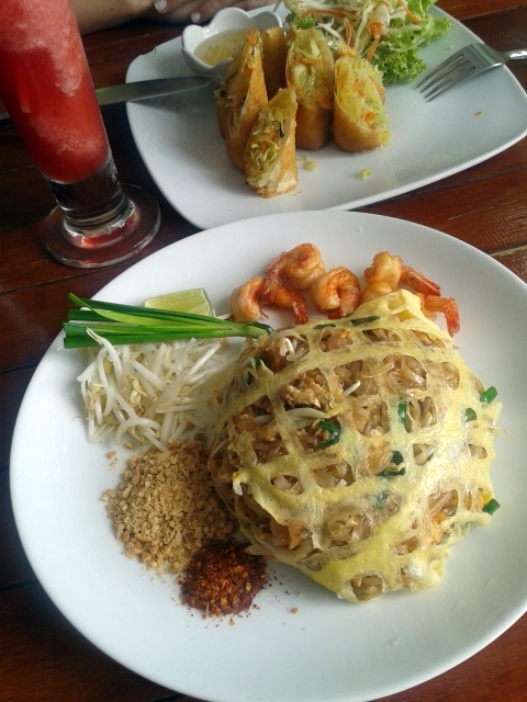 Pad Thai and Spring rolls accompanied by watermelon shake 